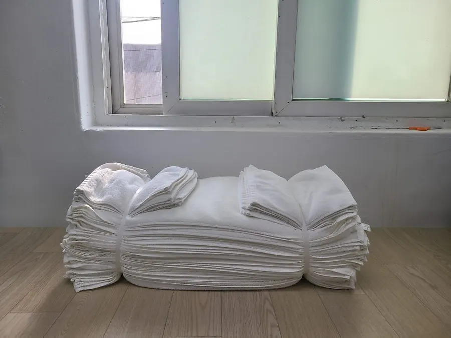 병원 수건 세탁 작업 사진